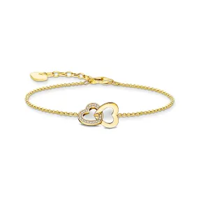 Bracelet with intertwined hearts pendant - gold