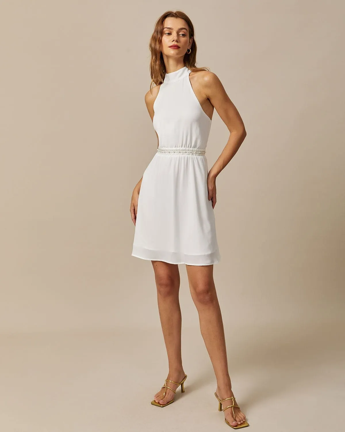 The White Mock Neck Pearls Backless Mini Dress